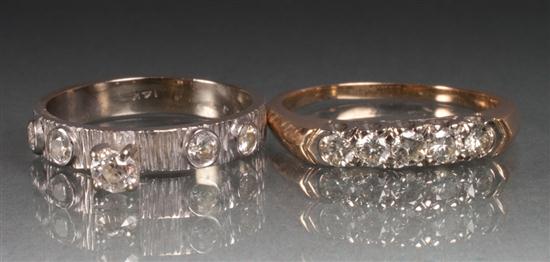 Two 14K gold and diamond rings