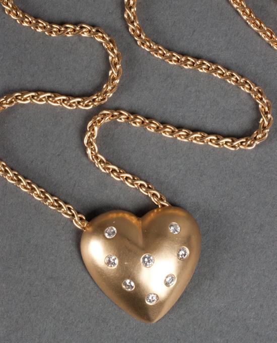 14K gold and diamond heart-form