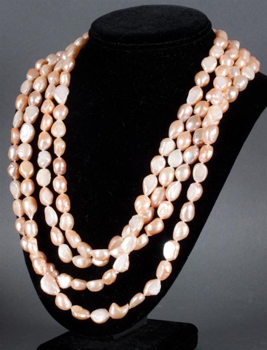 Lady's peach colored baroque pearl
