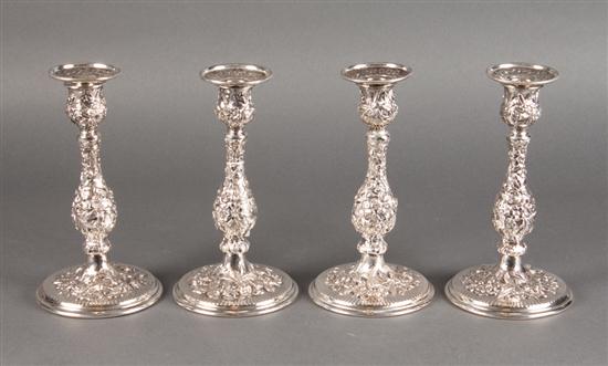 Four American repousse sterling