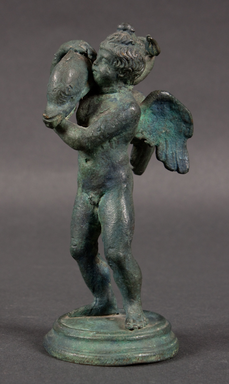 Cast bronze figure of boy with 13a0e5