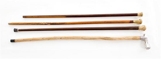 Collection of walking sticks and 13a630