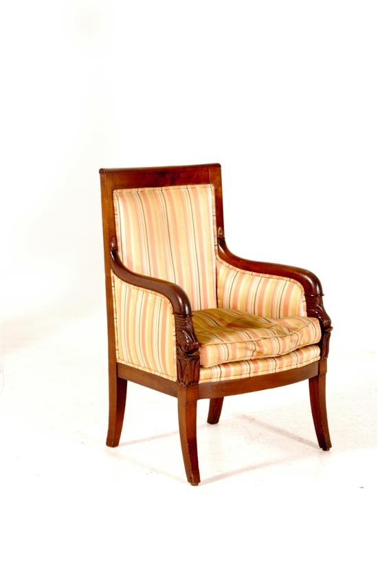 Charles X carved fruitwood armchair