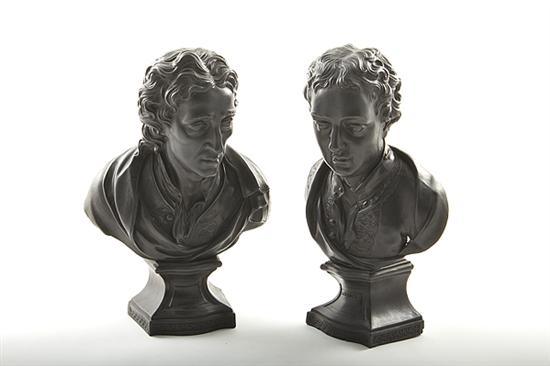 Pair black basalt busts after Hoskins