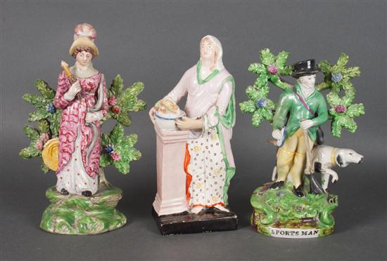 Pair of Prattware figures and a similar