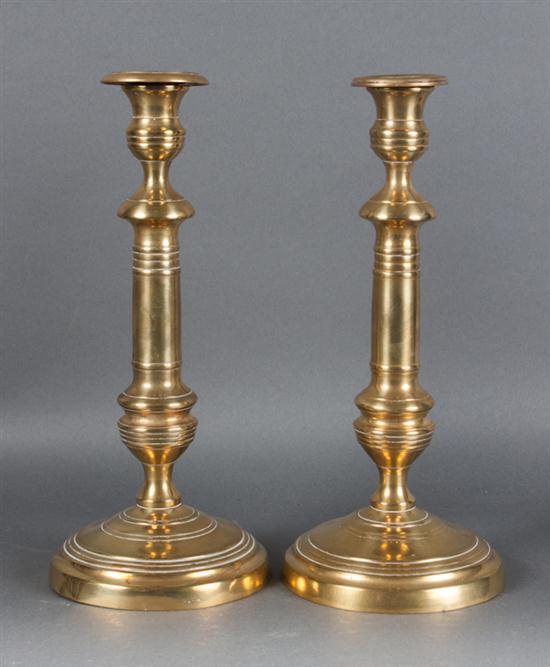 Pair of French cast brass candlesticks