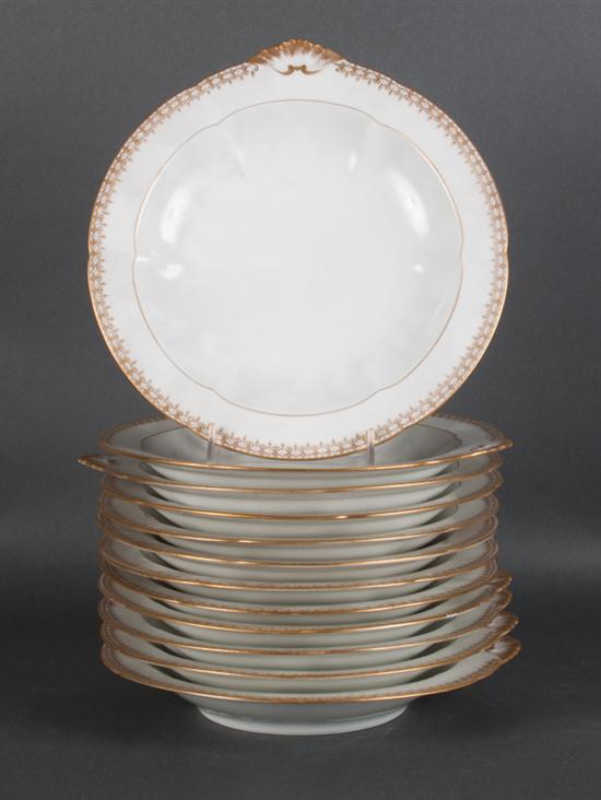 Set of 12 French gilt decorated