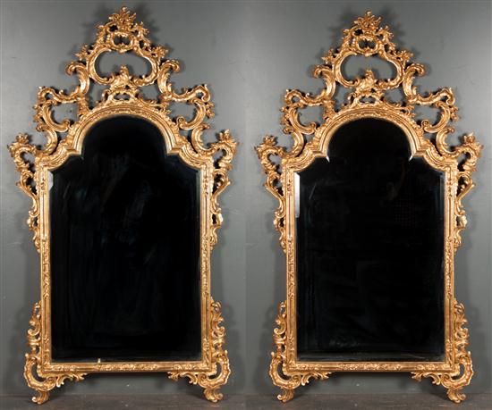 Pair of rococo style giltwood beveled