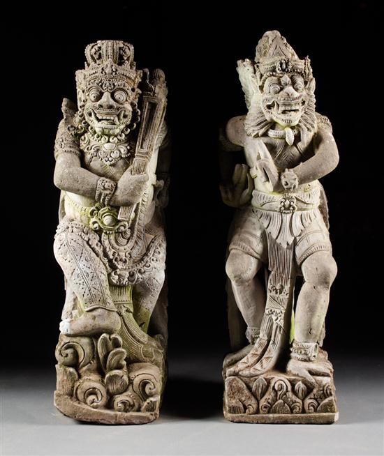 Pair of Balinese carved lava demon