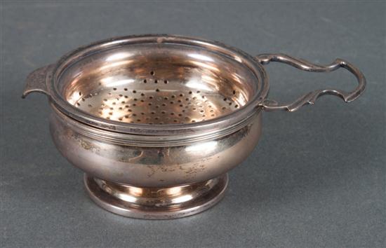 English sterling silver tea strainer