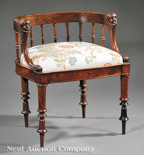 A Continental Carved Mahogany Armchair