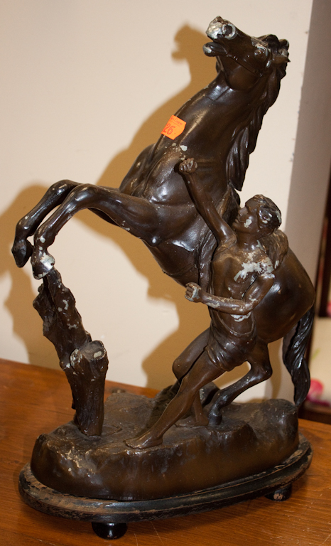 Painted spelter sculpture of a