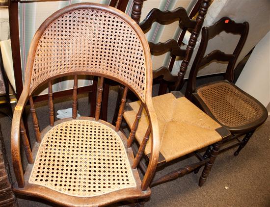 Two cane seat chairs and a ladder-back