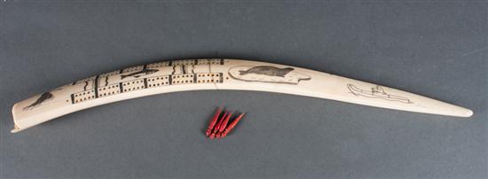 Walrus ivory scrimshaw cribbage board