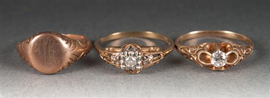 Three gold and diamond rings early 138de0