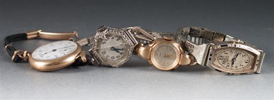 Group of ladys gold bracelet-watches