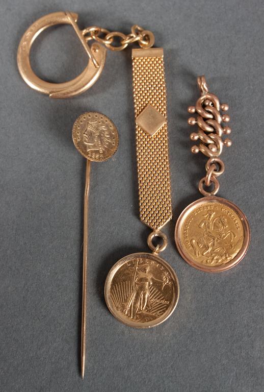 Group of gold coin jewelry including: