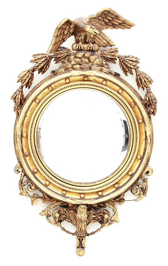 Carved giltwood convex mirror first