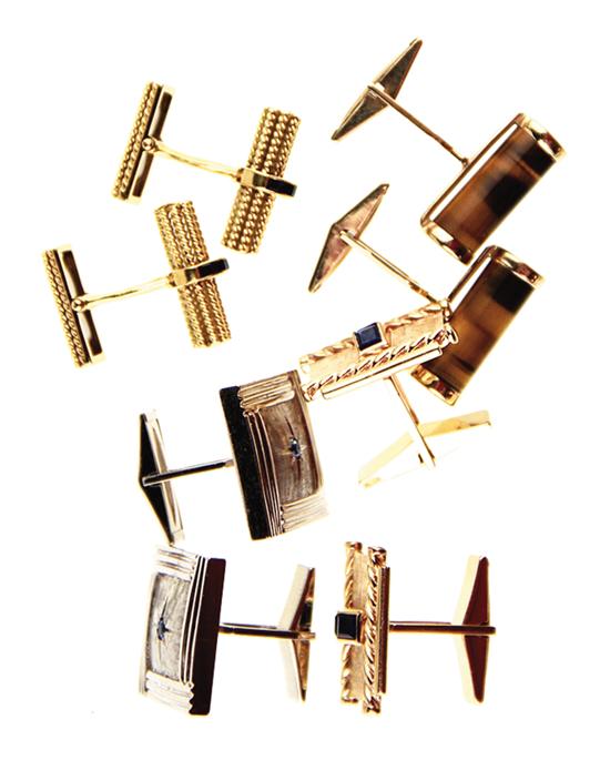 Collection of gold cufflinks pair