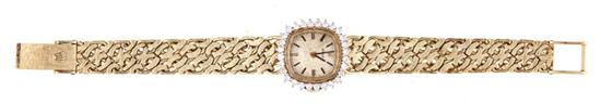 Rolex diamond and gold lady's wristwatch