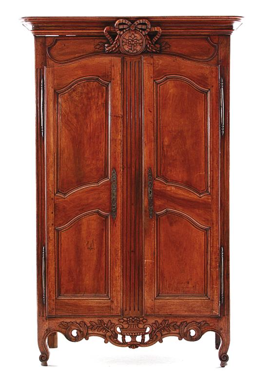 Louis XV carved walnut armoire