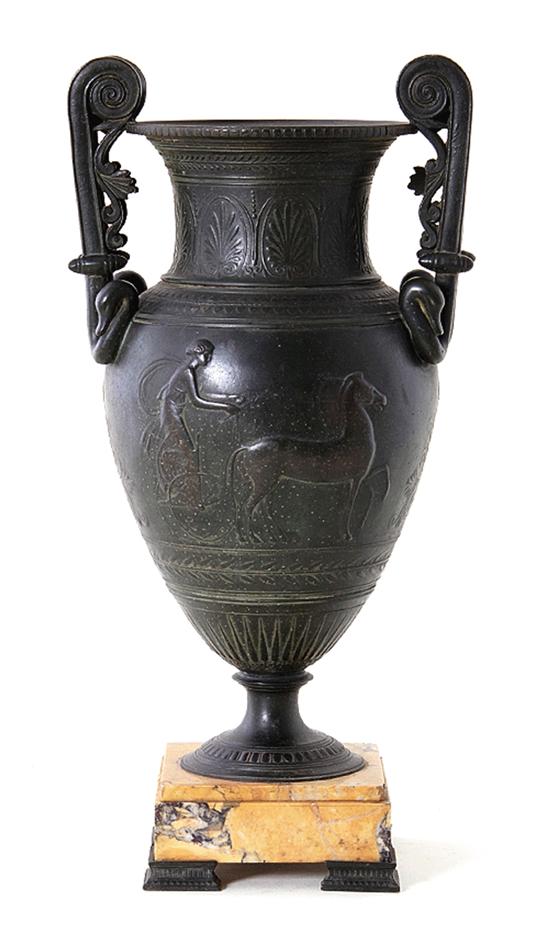 Neoclassical bronze urn on marble