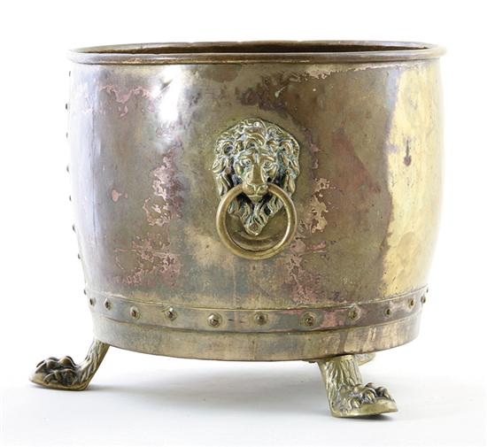 Continental brass footed jardiniere