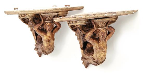 Pair Continental carved giltwood