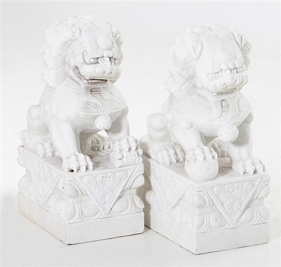 Pair carved stone Foo lions white