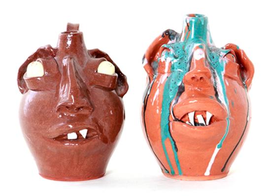 M L Owens stoneware face jugs 13950d