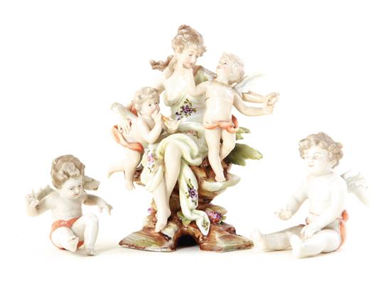 German porcelain figurals seated maiden