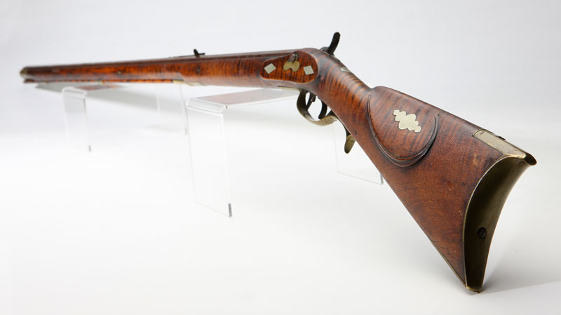 An American curly maple long rifle