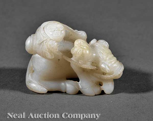 A Chinese White Jade Boy and Water