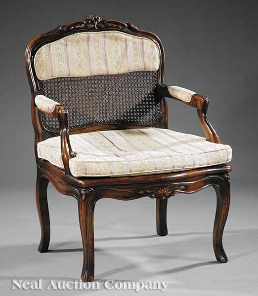 A Louis XV Carved Fruitwood Fauteuil 13d006