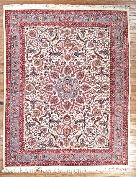 A Persian Carpet cream ground central