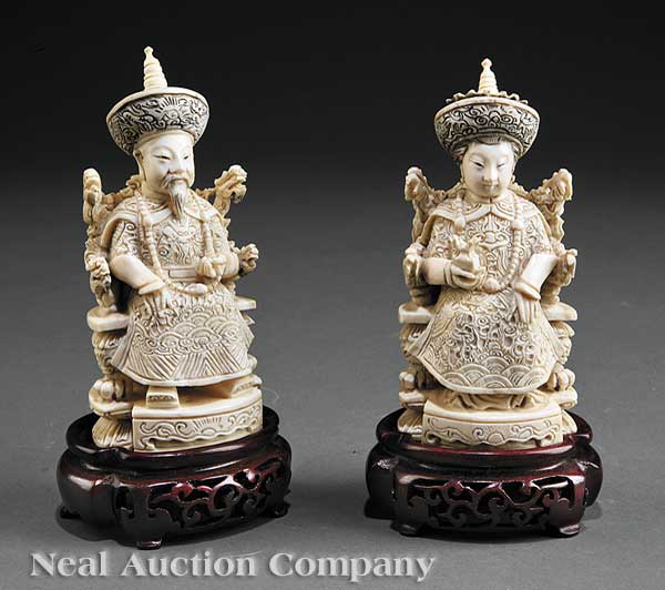 A Pair of Chinese Carved and Tinted