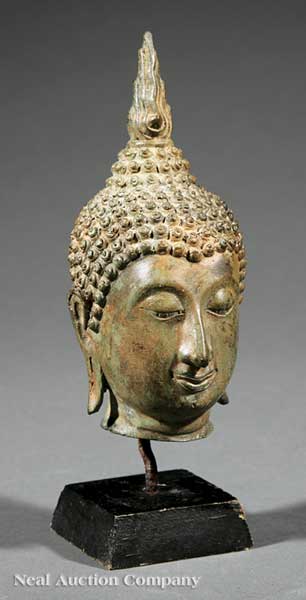 A Southeast Asian Bronze Head of Buddha