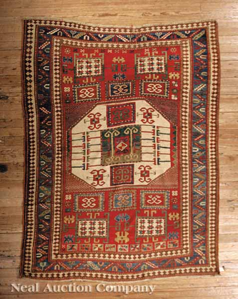 A Good Antique Carpet red and blue 13d4f0