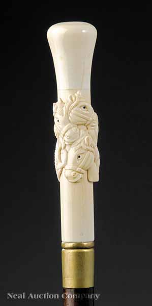 A Mahogany and Hand Carved Bone 13d5d6