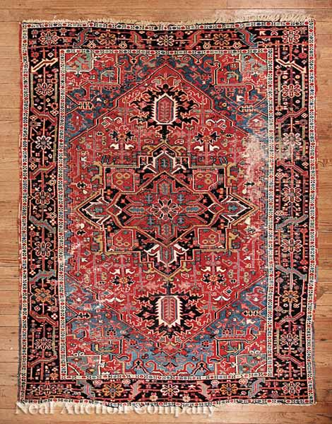 A Semi-Antique Heriz Carpet red