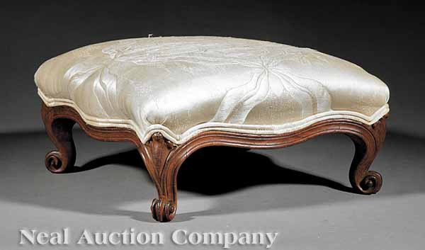 A Victorian Carved Rosewood Footstool