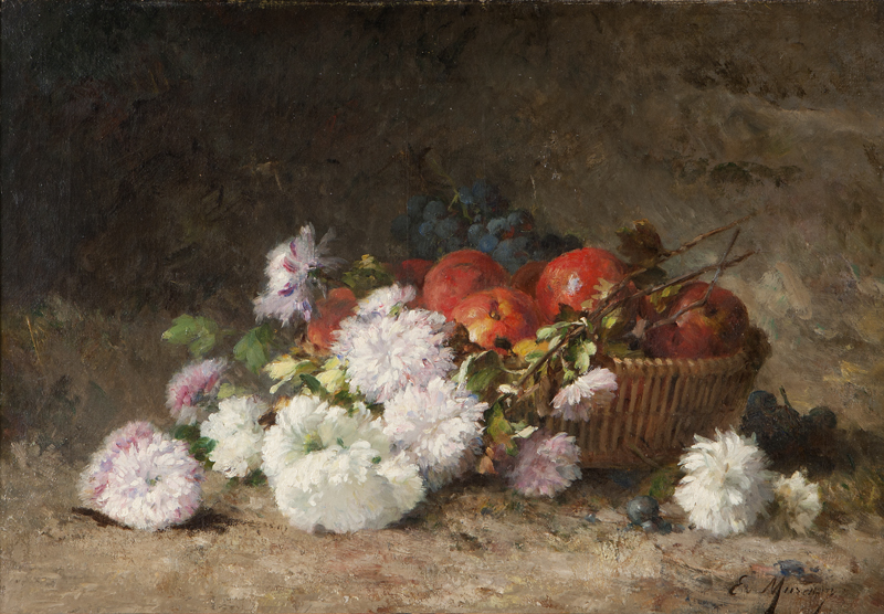 Grapes and apples in a wicker basket
