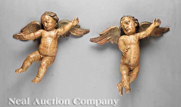 A Pair of Italian Polychrome Carved
