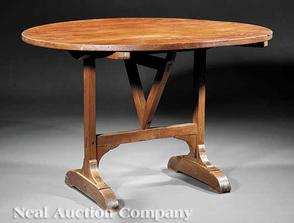 An Antique French Pine Wine Table