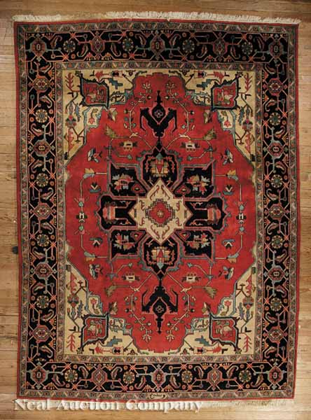An Antique Heriz Carpet red ground 13b52a