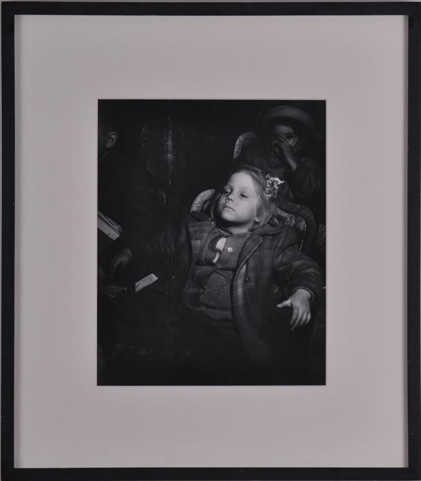 WEEGEE (1899-1968): GIRL IN THEATRE