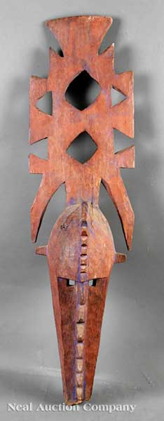 An African Carved Wood Nweka Mask