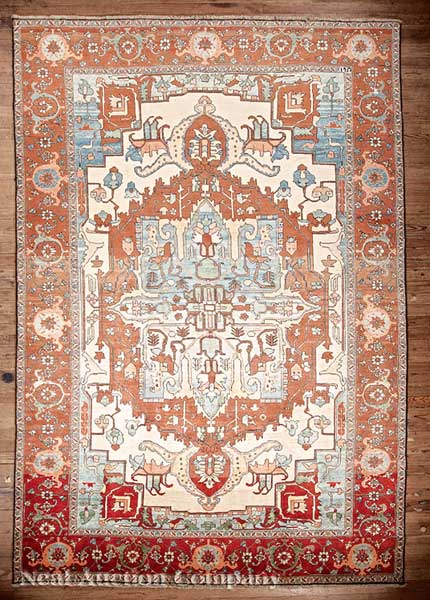 A Persian Serapi Carpet cream and