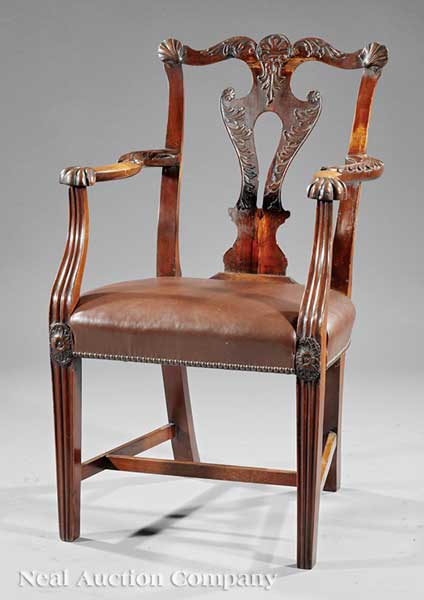 An Antique George III Carved Mahogany