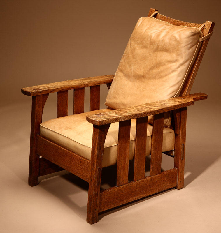 A Gustav Stickley oak Morris chair Circa